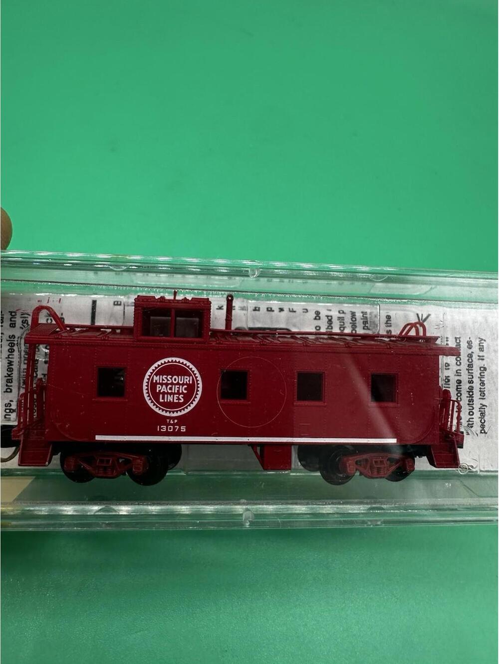 Micro Trains N Scale 36' Riveted Steel Side Caboose Missouri Pacific MP 100020